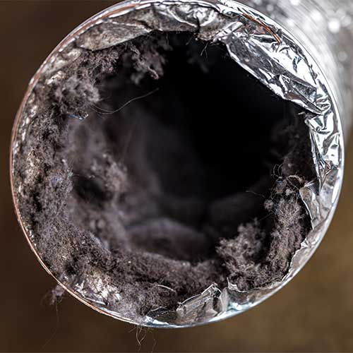 A dryer Vent with lot of lint