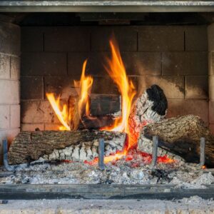 wood burning in a blackened firebox