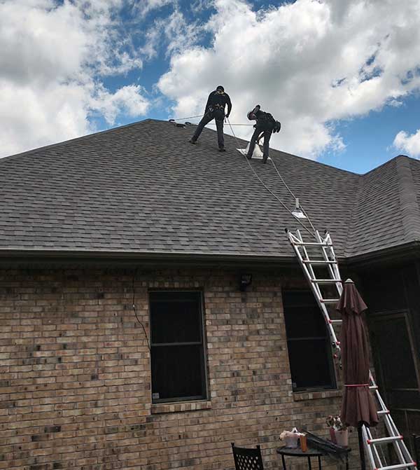 Technicians on Roof
